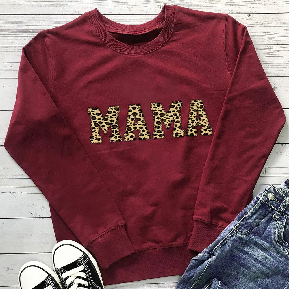 Leopard print sweatshirt in a range of colours, including white, pink, yellow, grey, green, black, and wine red. Relaxed, oversized fit for comfort and style.