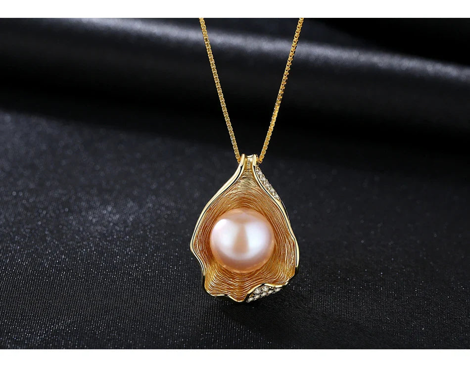 Elegant pearl pendant necklace with sterling silver setting, featuring a modern geometric design