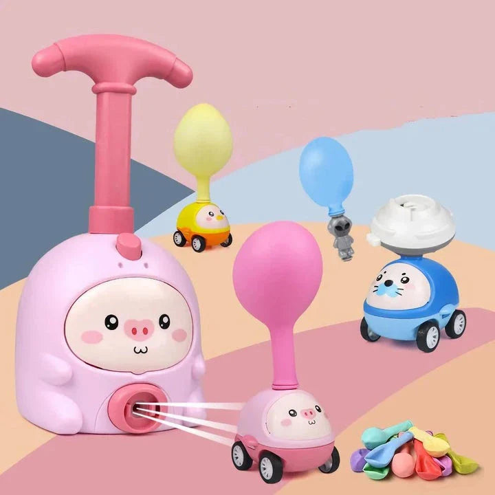 Balloon-powered launcher and car set for children, featuring a pink pig design and components for educational science play