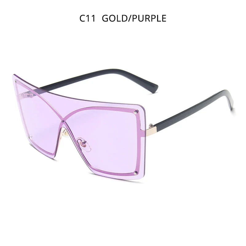 Fashionable oversized flat top sunglasses with gradient lenses and a sleek, rimless plastic frame