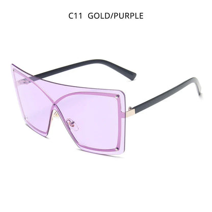 Fashionable oversized flat top sunglasses with gradient lenses and a sleek, rimless plastic frame