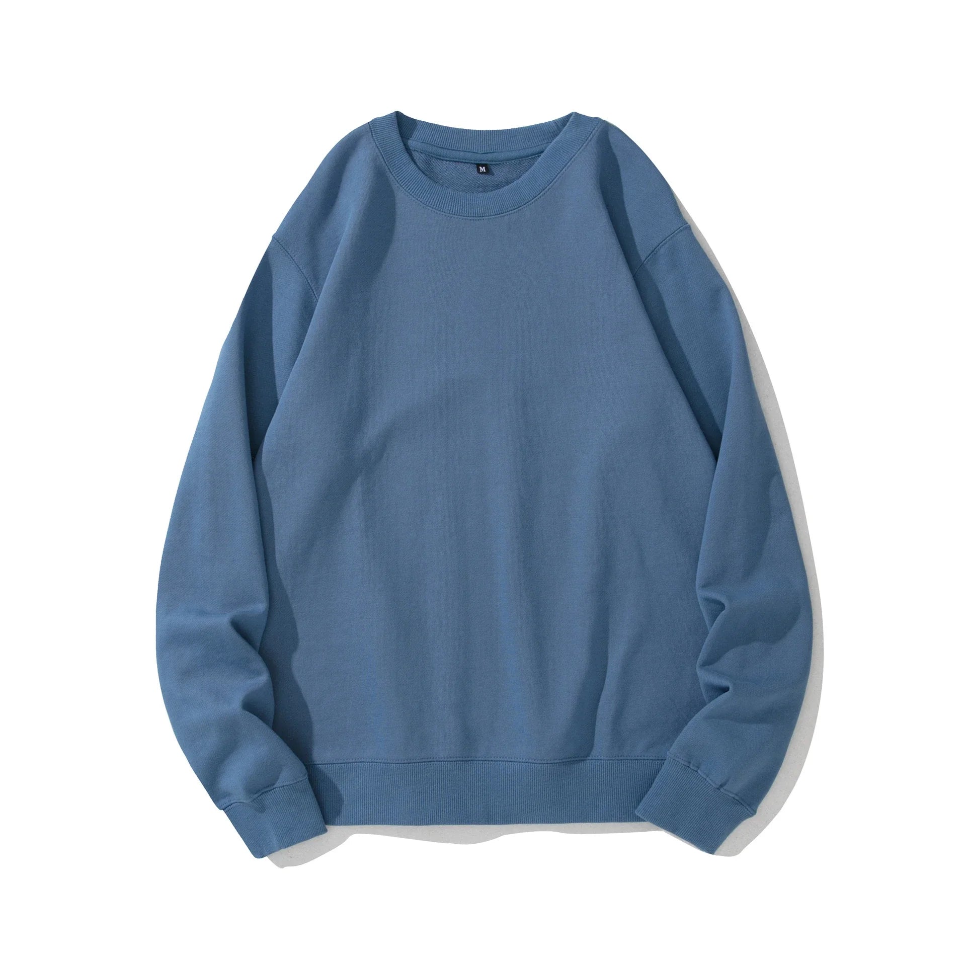 Premium heavyweight knitted jumper in a range of solid colours, made with soft cotton terry fabric for cosy comfort.