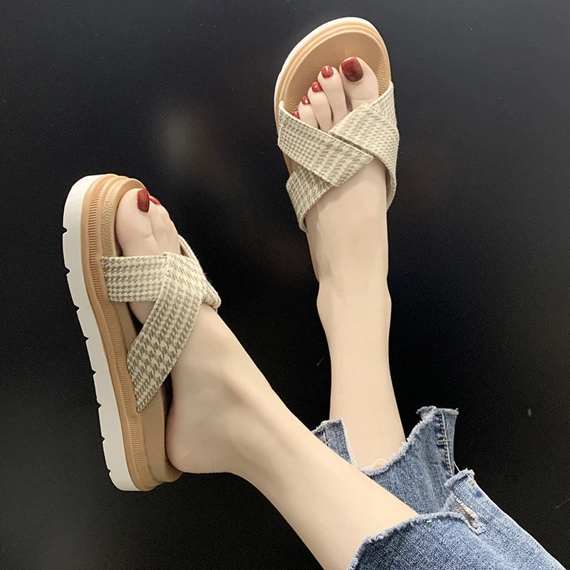 Premium non-slip herringbone slippers with a bow accent, featuring a canvas upper, fetal cowhide lining, and a rubber sole for comfort and stability.