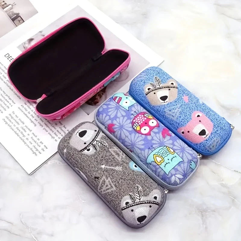 Cartoon-themed zippered eyeglass case in pink colour, featuring a playful and protective design for children's eyewear