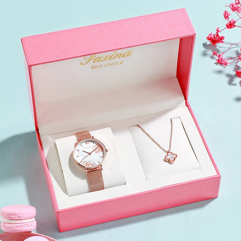 Elegant French ladies' fashion watch with stainless steel case and leather strap, featuring a white dial and classic design