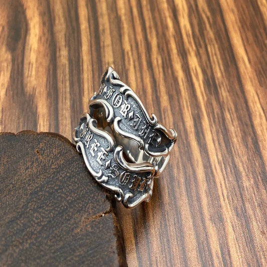 A personalized retro-style sterling silver ring with a ribbon design, made for men's fashion and accessory needs.