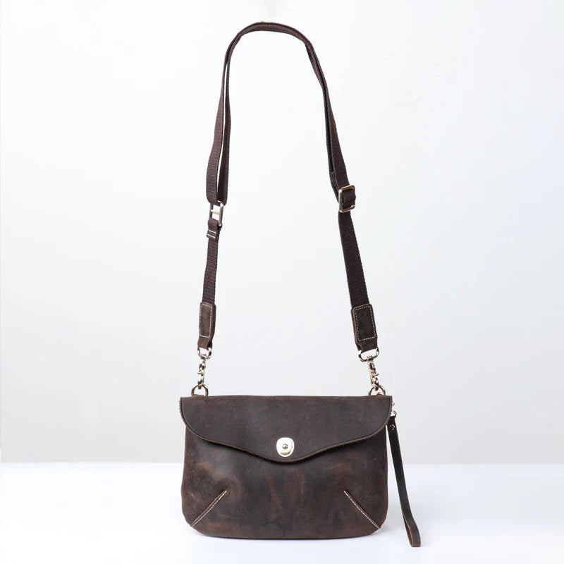 Premium handcrafted leather messenger bag in a classic British design, featuring a sturdy construction and spacious interior for the modern gentleman's everyday essentials.