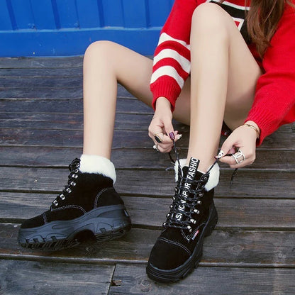 Stylish British platform boots with faux suede upper, lace-up closure, and wedge heel design