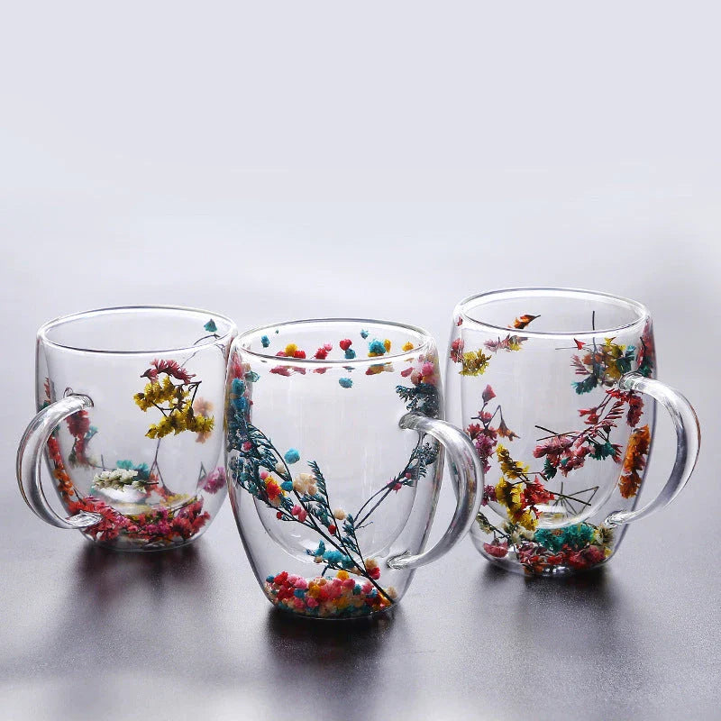 Elegant double-walled glass tea mug with captivating floral display, perfect for hot and cold beverages