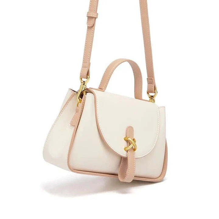 Luxury leather shoulder bag for women, featuring a sleek design, spacious interior, and premium split leather construction.