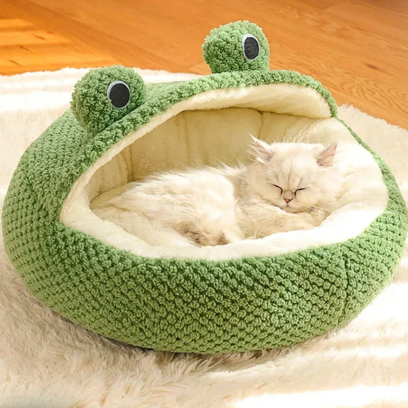 Cosy frog-shaped pet bed made of plush bubble velvet material, providing warmth and comfort for small cats and dogs