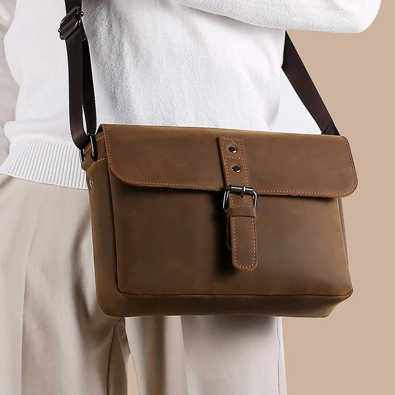 Premium quality large capacity shoulder bag in sleek black colour with latch closure and interior pockets, perfect for modern British lifestyle