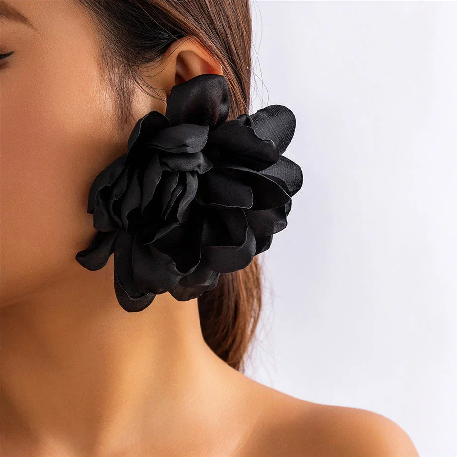 Exquisite fluffy fabric flower stud earrings in a black metal colour, featuring oversized fabric blooms for a unique and elegant design.