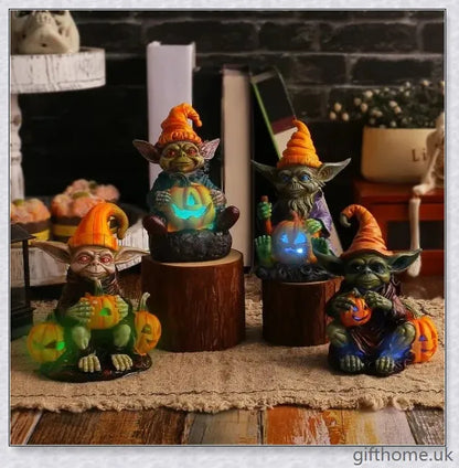 Eerie Halloween Resin Figurine with Glowing Pumpkin Lamp, a spooky and enchanting décor piece for your holiday celebrations