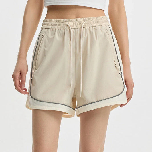 Premium quick-drying sports shorts for women with a trendy colour-block design and adjustable waist