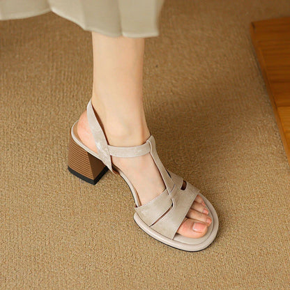 Genuine leather gladiator sandals with chunky heel, open-toe design, and secure buckle closure for summer style and comfort.