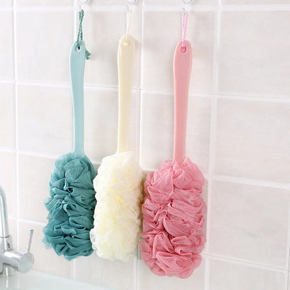Long-handled soft mesh bath and shower brush with wave-shaped design for easy reach and gentle exfoliation