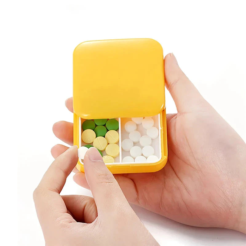 Compact push-pull pill case organiser in various vibrant cartoon-inspired colours for convenient medication management