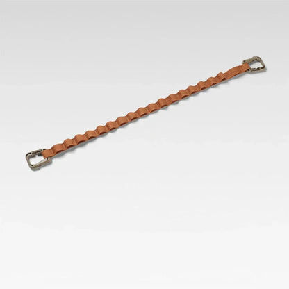 Adjustable camping strap with multi-ring design for organising outdoor gear and supplies