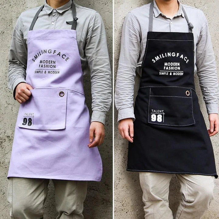 A stylish and practical Nordic-inspired canvas barista apron with a spacious front pocket and adjustable neck strap for a comfortable fit.