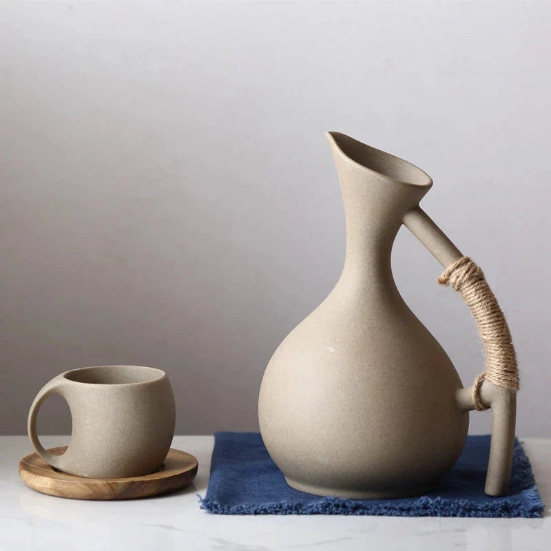 Elegant 1.3L ceramic pitcher in white, grey, and blue colours suitable for hot and cold beverages