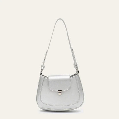 Elegant and versatile vegan leather shoulder bag with adjustable strap, flap cover, and interior pockets for modern British women