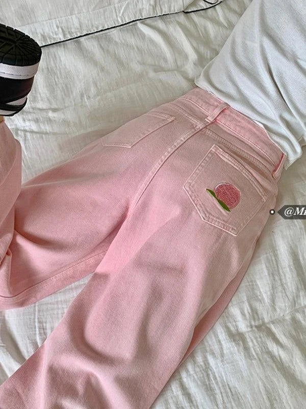 Premium cotton denim high-waist wide-leg trousers in a flattering, figure-hugging silhouette
