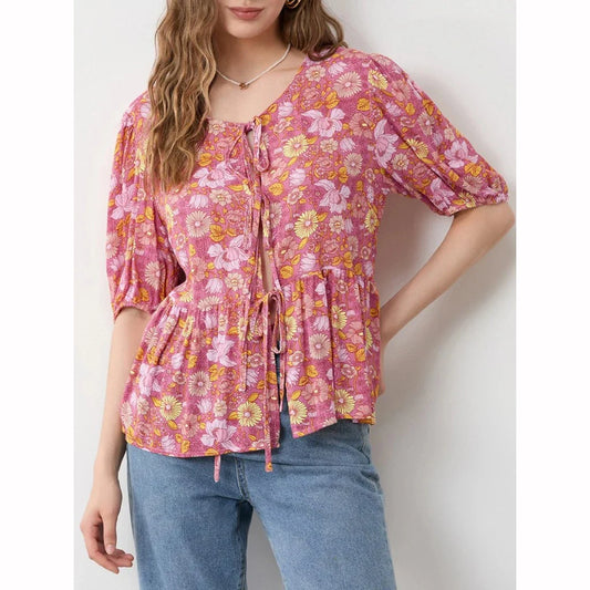 Elegant floral lace blouse with bow v-neck, showcasing vintage charm and modern comfort