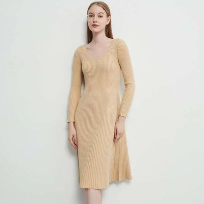 Elegant and cosy midi sweater dress in black, featuring a solid, body-hugging silhouette and comfortable knit fabric