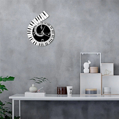 Decorative wall clock with treble clef and piano keyboard design in black and white