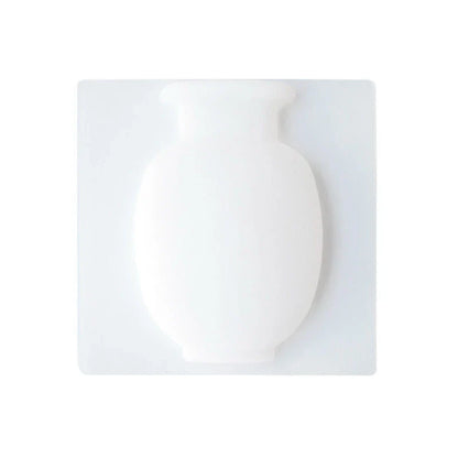 Silicone suction cup wall vase in pink colour, perfect for decorating UK homes