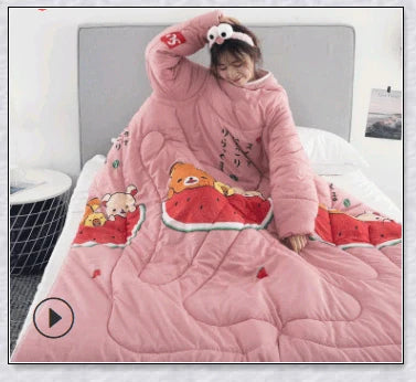A cosy, wearable quilt with sleeves in a variety of colourful designs, perfect for staying warm and comfortable during the winter months.