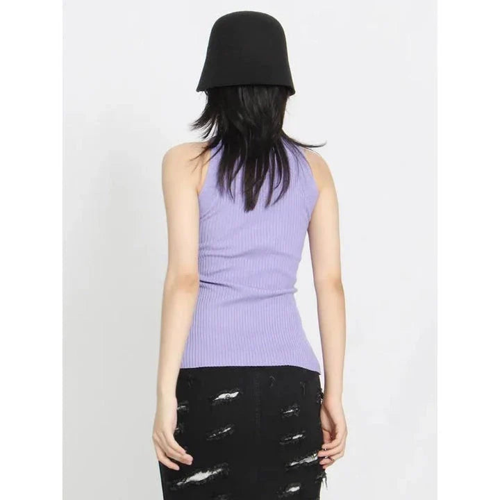 Elegant and versatile knitted sleeveless tank top with a unique hollow-out design, perfect for chic British style