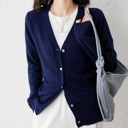 Chic v-neck single breasted cardigan in blue, green, and pink colours with a sophisticated and timeless design