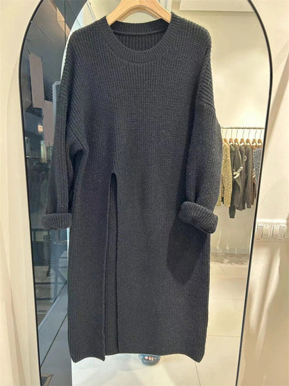Relaxed mid-length jumper dress in a variety of colours, featuring an A-line silhouette and premium knit fabric for a comfortable, flattering fit.