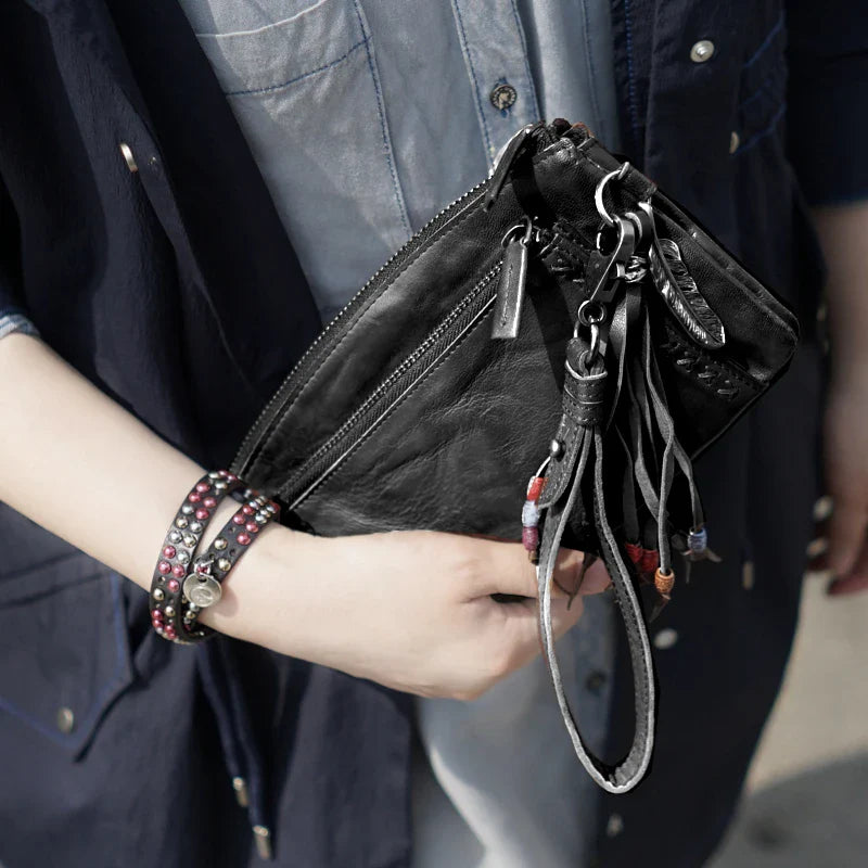 Premium handcrafted vintage leather wallet in classic black colour, featuring a spacious interior with multiple compartments for organised storage.