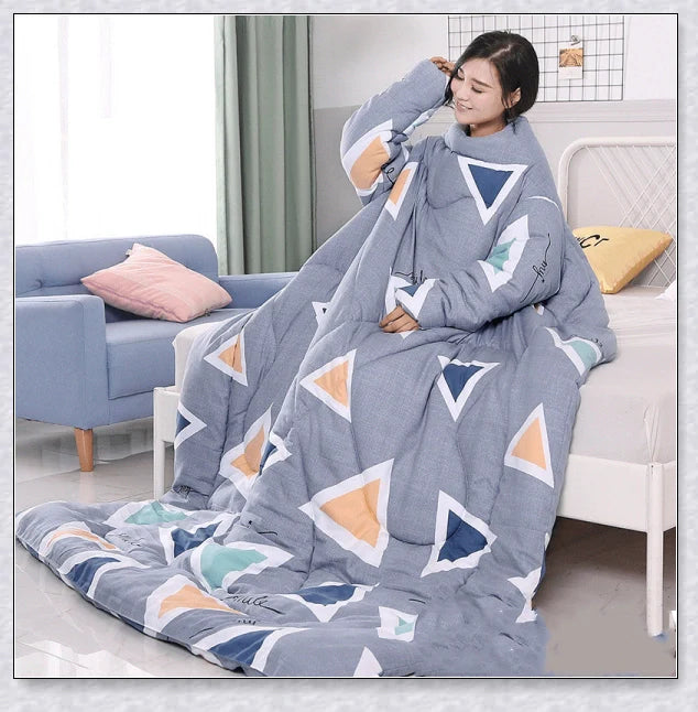 A cosy, wearable quilt with sleeves in a variety of colourful designs, perfect for staying warm and comfortable during the winter months.