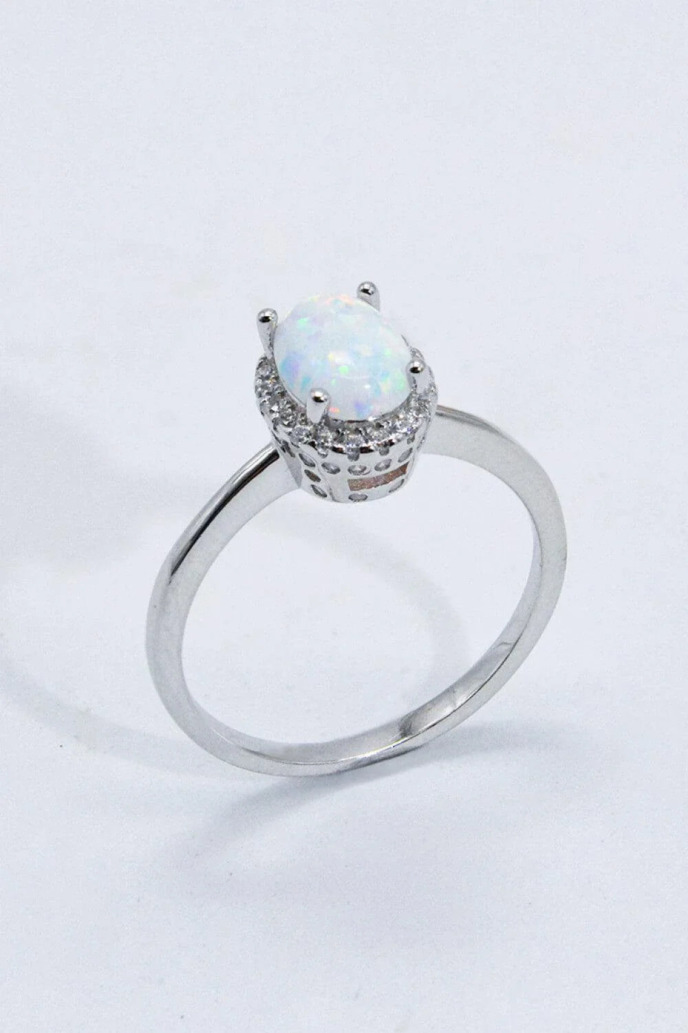 Premium 925 sterling silver ring featuring a captivating Australian opal gemstone, showcasing the enduring craftsmanship of British jewellery design.