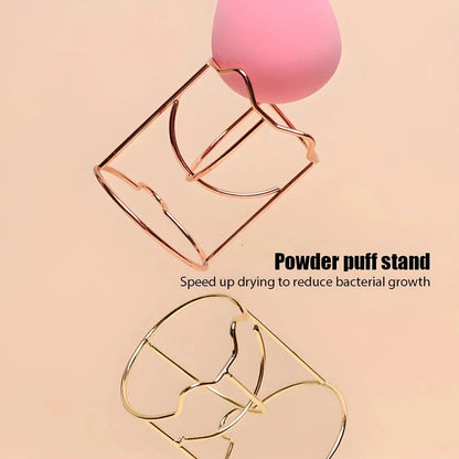 Elegant stainless steel makeup sponge drying rack in gold and rose gold finishes, designed to keep your beauty tools organised and fresh.