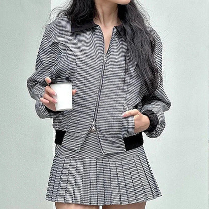 Elegant high-waisted pleated skirt and houndstooth cardigan set, perfect for work or weekend wear