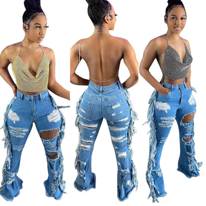 Stylishly distressed tassel jeans with light blue wash and straight-leg silhouette