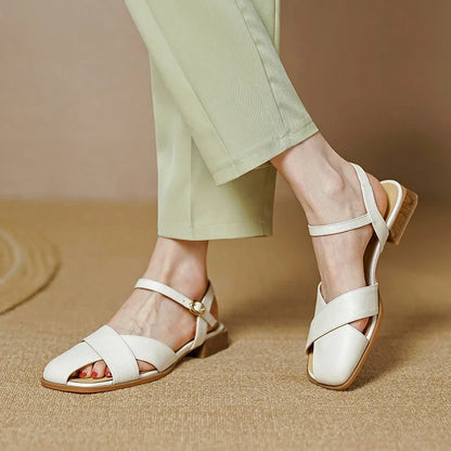 Stylish and comfortable low-heel leather sandals in green, perfect for summer wear
