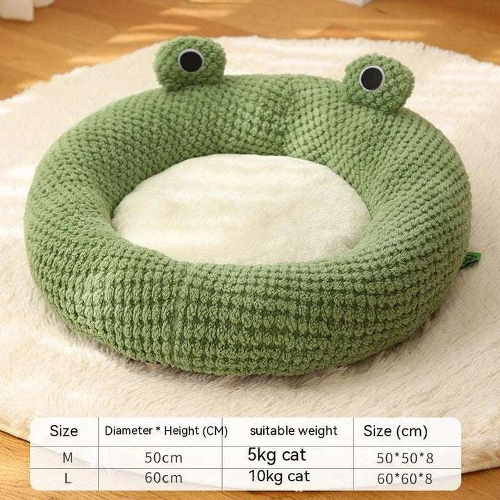 Cosy frog-shaped pet bed made of plush bubble velvet material, providing warmth and comfort for small cats and dogs