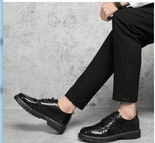 Sleek and sophisticated premium leather dress shoes in a dark skin black colourway, featuring a crocodile pattern and durable rubber sole