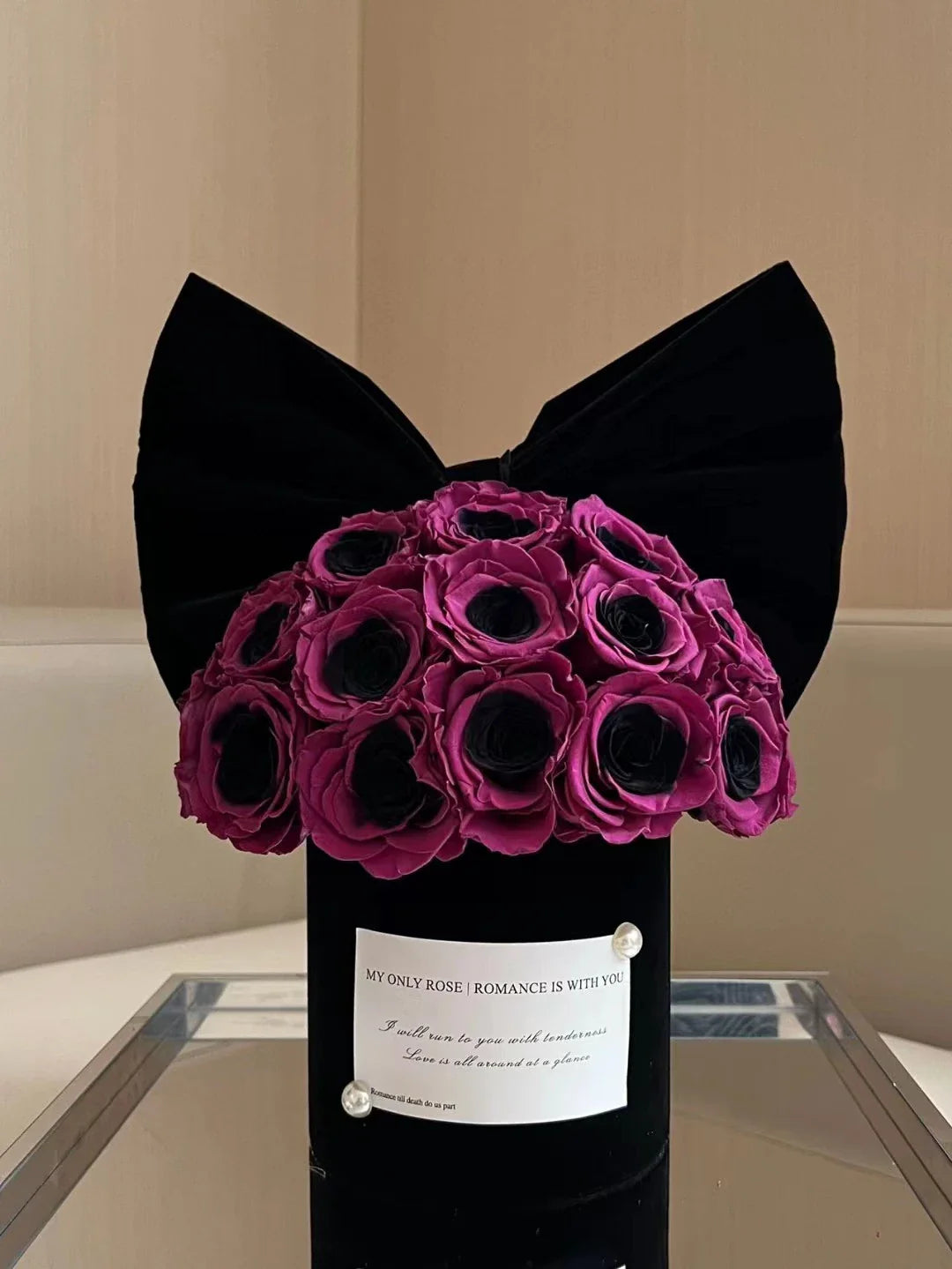 Elegant black plum bow flower pot with preserved plum blossoms, a sophisticated and long-lasting home decor piece