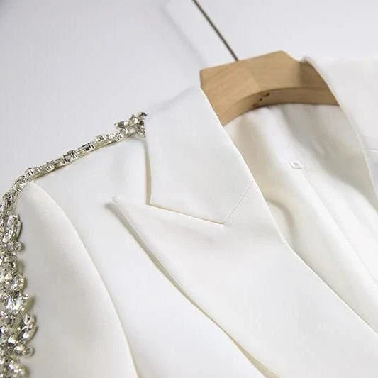 Elegant British designer women's suit set with beaded blazer and flare pants in white
