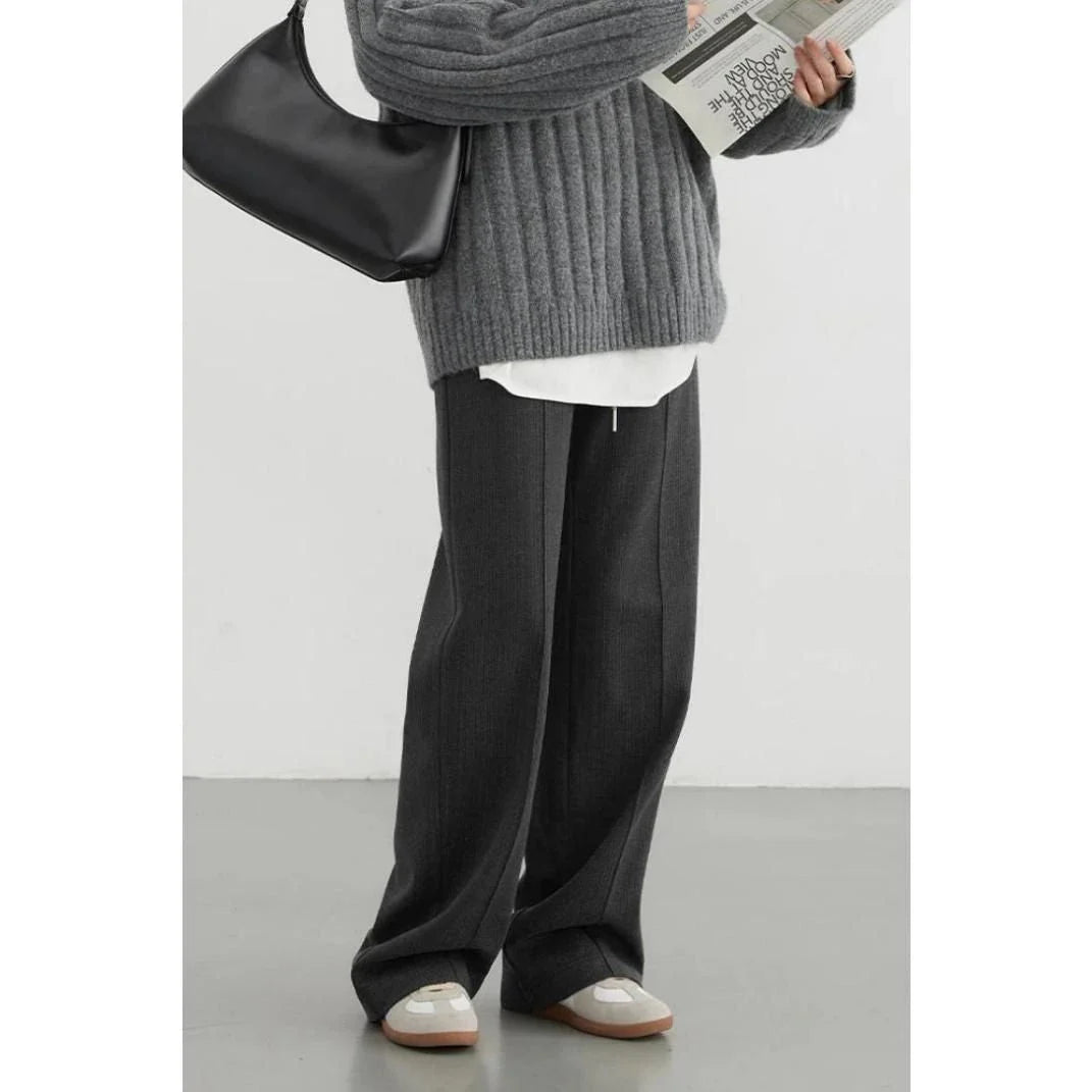 Premium high-waisted striped wide-leg trousers for stylish women, featuring a pleated front and brushed fabric for comfort