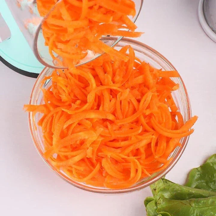 A premium manual vegetable cutter with stainless steel blades and a contemporary blue design, perfect for efficient meal preparation in any UK kitchen.