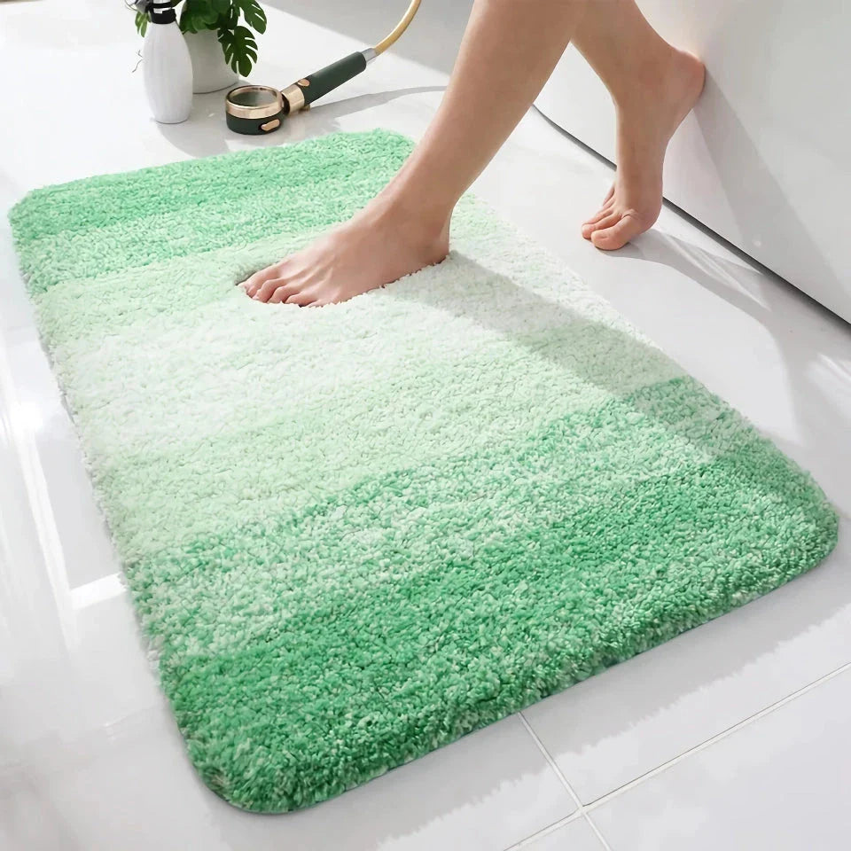 Luxurious microfibre absorbent bath mat with soft, plush texture and non-slip rubber backing for comfort and safety in the bathroom