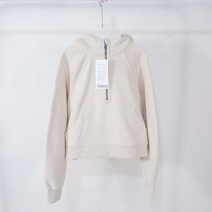 Premium women's sports fleece hoodie with half zip, available in a range of sophisticated colours